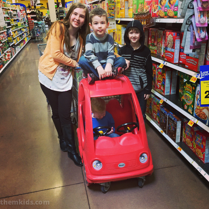 kids at the grocery store
